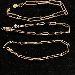 NWOT, Mevecco set of 3 gold tone paper clip style bracelets.